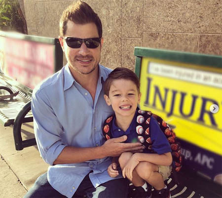 A picture of Nick and his son.